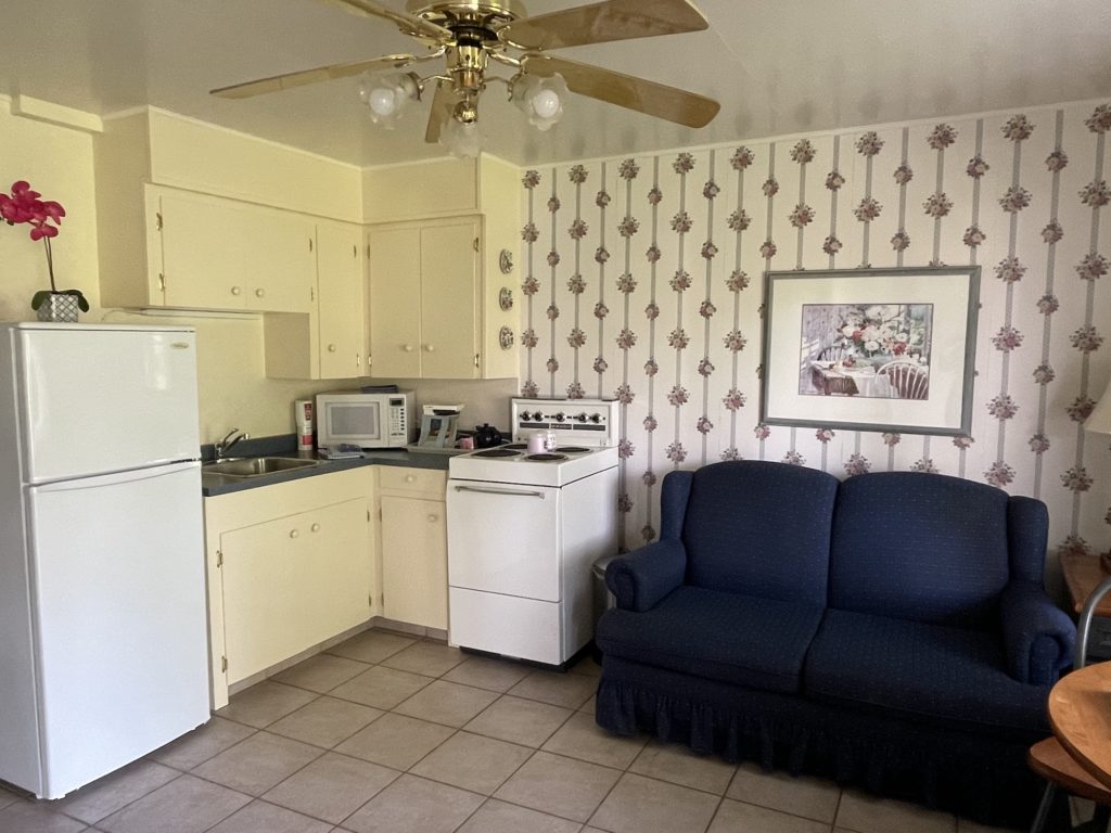 Kitchenette with stove, fridge, microwave in Two Bedroom Kitchenette