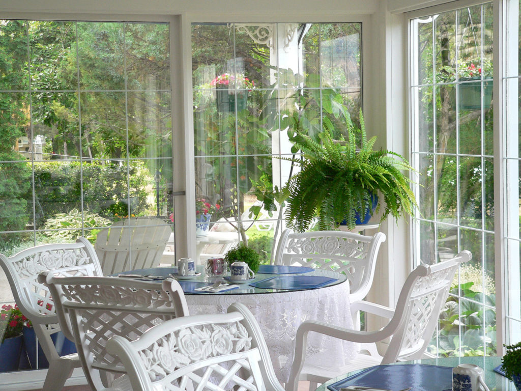 Breakfast is served to your table in the sunroom