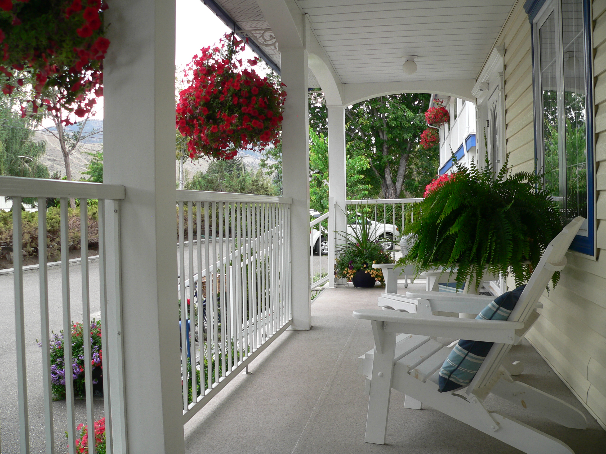 Relax in the Adirondack chairs on the veranda when you choose the Veranda Room